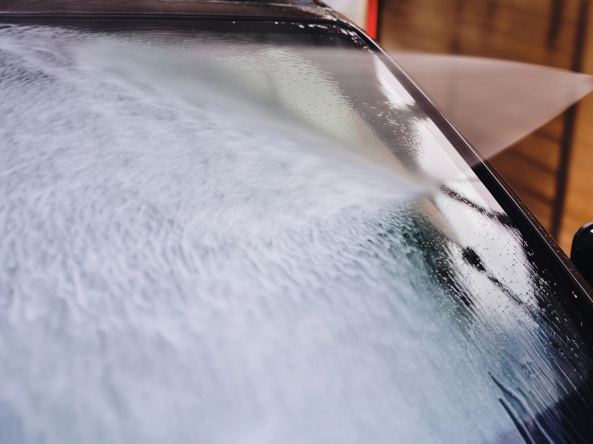Vehicle exterior being professionally detailed
